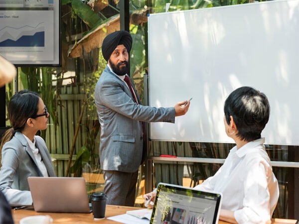 explaining-in-front-of-white-board